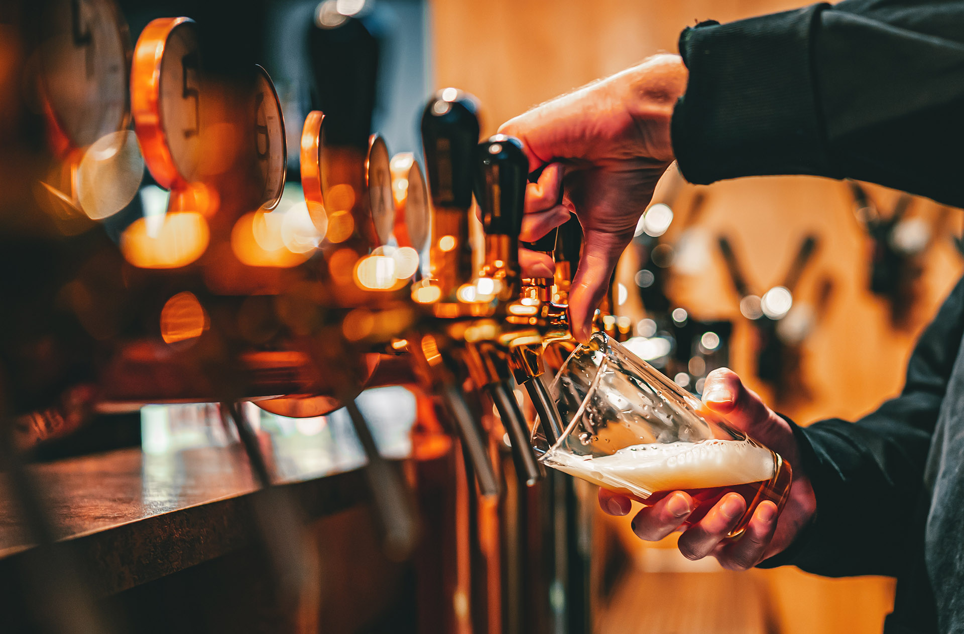 Beer being poured at the bar